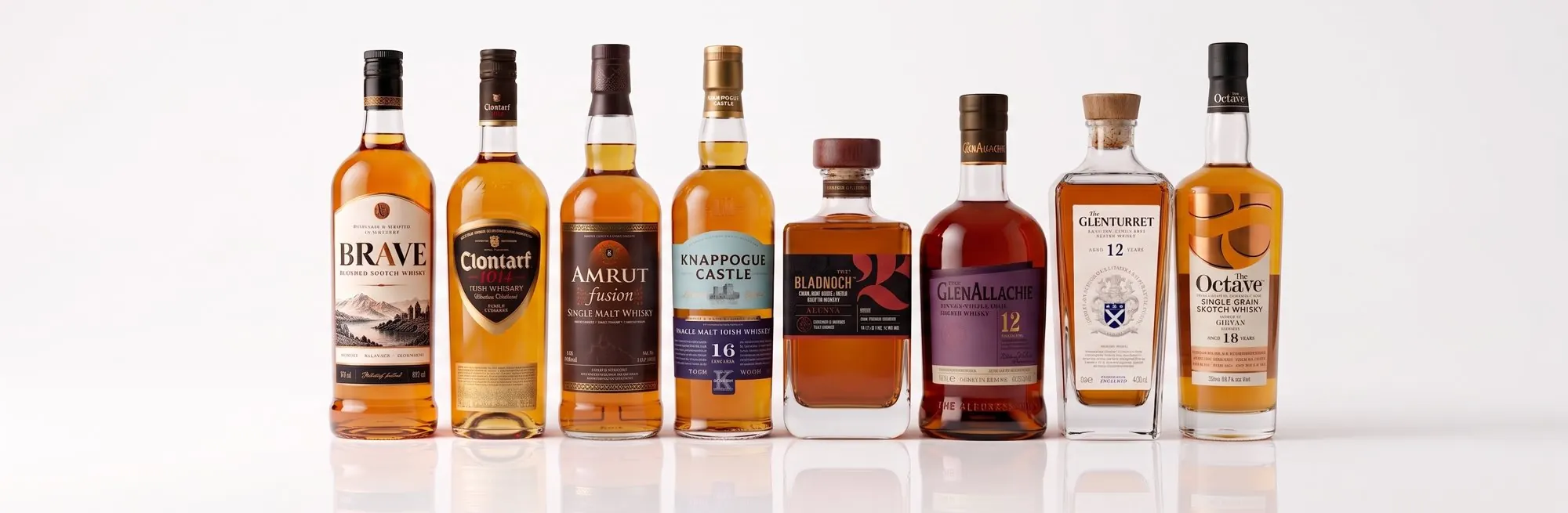 The portfolio line-up: Brave, Clontarf, Amrut Fusion, Knappogue Castle, Bladnoch, The GlenAllachie, The Glenturret and The Octave bottles side by side